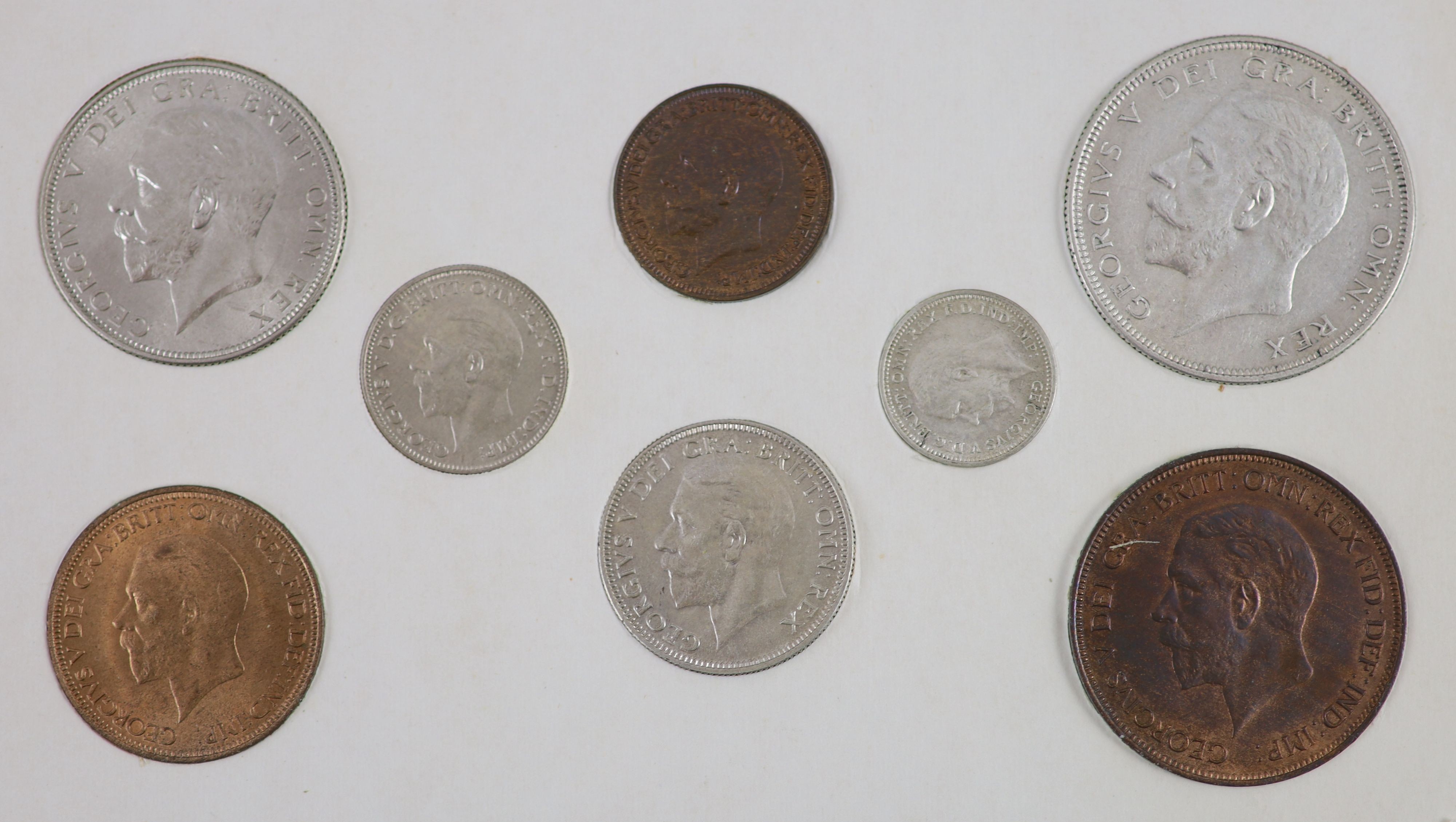 George V specimen set of nine coins, 1935, fourth coinage, comprising Crown (S4048), cleaned UNC, halfcrown and shilling, cleaned EF, florin, sixpence, cleaned UNC, the penny, halfpenny and farthing, toned UNC, halfpenny